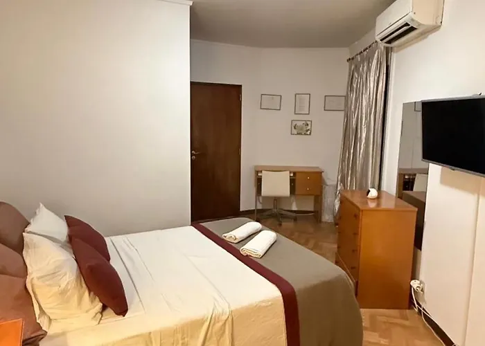 Quarto em Acomodações Particulares Suítes Happy